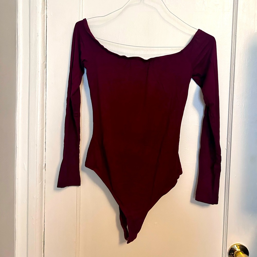 Maroon, off the shoulder body suit.